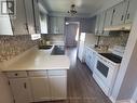 Upper - 16 Nortonville Drive, Toronto, ON  - Indoor Photo Showing Kitchen With Double Sink 