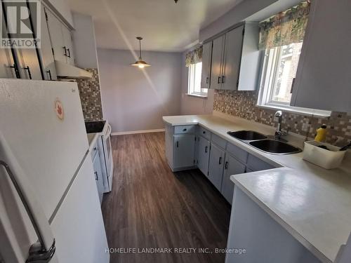 Upper - 16 Nortonville Drive, Toronto, ON - Indoor Photo Showing Kitchen With Double Sink