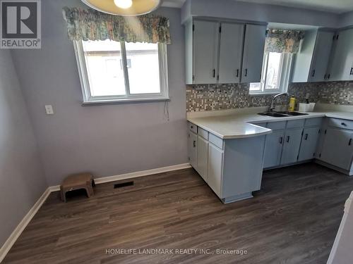 Upper - 16 Nortonville Drive, Toronto, ON - Indoor Photo Showing Kitchen With Double Sink