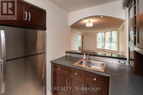 609 - 140 Dunlop Street E, Barrie, ON - Indoor Photo Showing Kitchen With Double Sink