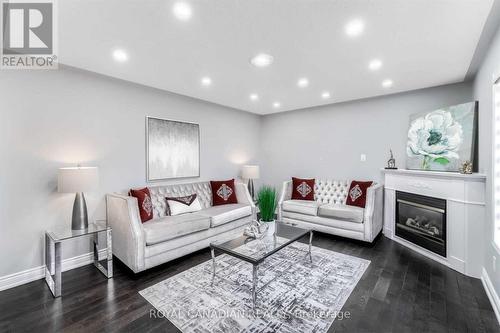 5 Bunchgrass Place, Brampton, ON - Indoor Photo Showing Living Room With Fireplace