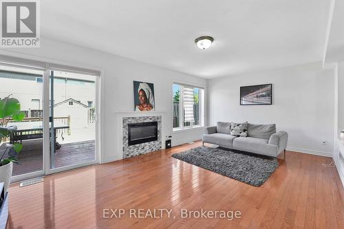 8435 Kelsey Crescent, Niagara Falls, ON - Indoor Photo Showing Living Room With Fireplace