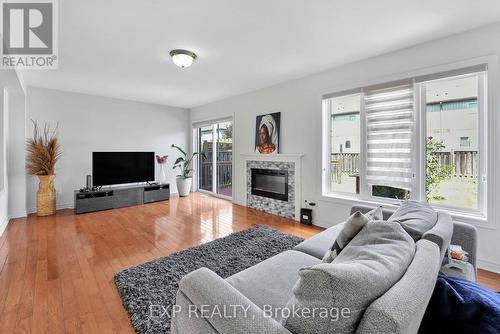 8435 Kelsey Crescent, Niagara Falls, ON - Indoor Photo Showing Living Room With Fireplace