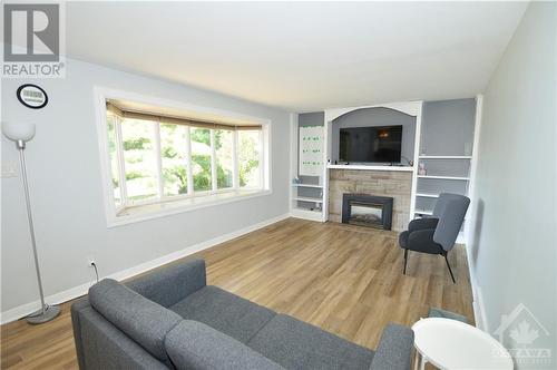 13 Bradley Street, Stittsville, ON - Indoor Photo Showing Living Room With Fireplace