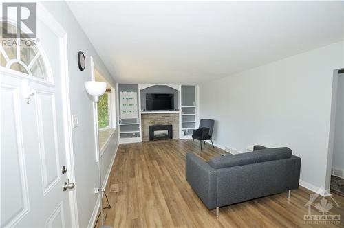 13 Bradley Street, Stittsville, ON - Indoor Photo Showing Living Room With Fireplace