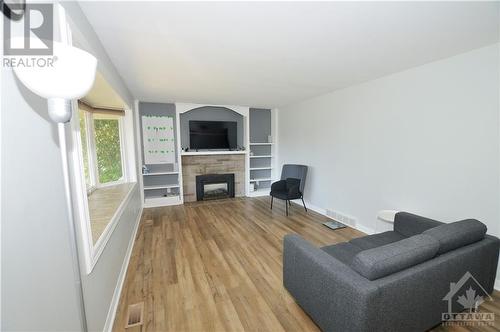 13 Bradley Street, Stittsville, ON - Indoor Photo Showing Living Room With Fireplace