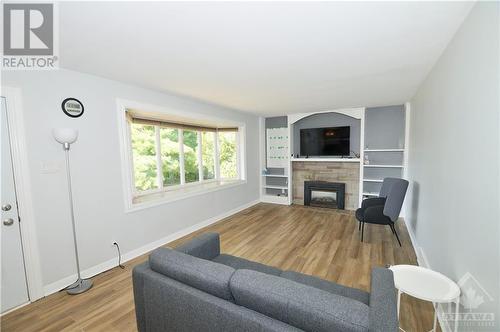 13 Bradley Street, Stittsville, ON - Indoor Photo Showing Living Room With Fireplace