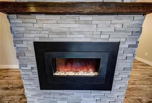 103-4305 Bellevue Drive, Vernon, BC - Indoor Photo Showing Living Room With Fireplace