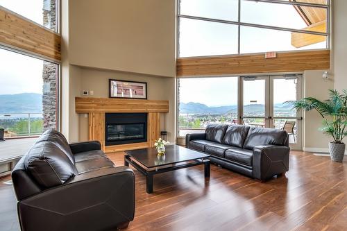 204-3220 Skyview Lane, West Kelowna, BC - Indoor Photo Showing Living Room With Fireplace