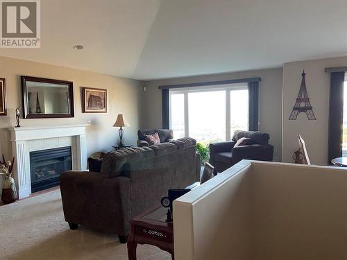 673 Royal View Drive, Kelowna, BC - Indoor Photo Showing Living Room With Fireplace