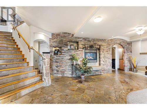 1778 Vineyard Drive, Kelowna, BC - Indoor Photo Showing Other Room With Fireplace