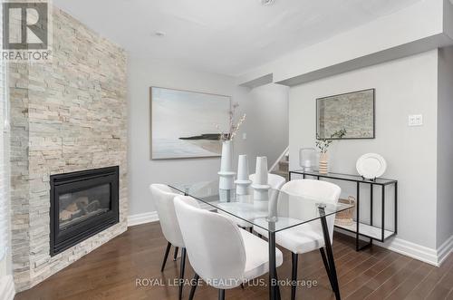 2002 - 12 Sudbury Street, Toronto, ON - Indoor Photo Showing Dining Room With Fireplace