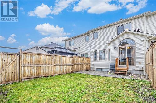 Fully fenced spacious backyard, perfect for summer barbecues and outdoor gatherings. - 445 Barrick Hill Road, Ottawa, ON - Outdoor