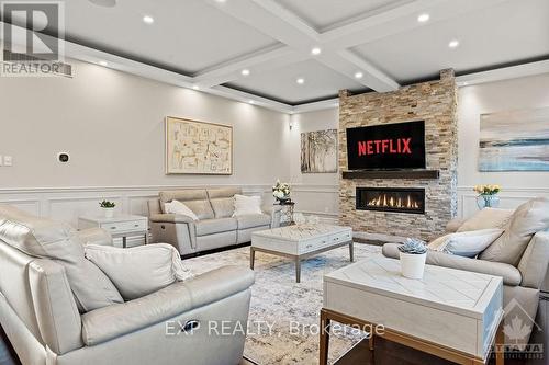 6990 Disputed Road, Lasalle, ON - Indoor Photo Showing Living Room With Fireplace