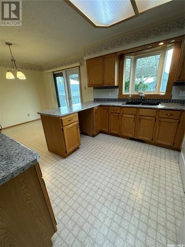 532 Simpson Crescent, Hudson Bay, SK - Indoor Photo Showing Kitchen With Double Sink