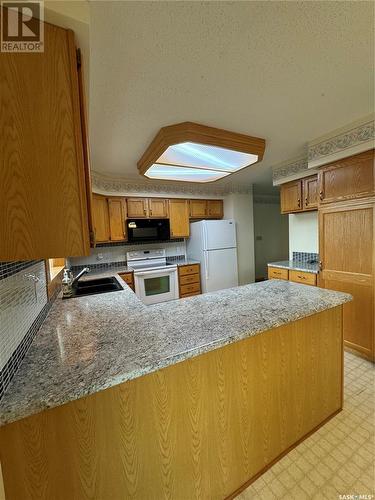 532 Simpson Crescent, Hudson Bay, SK - Indoor Photo Showing Kitchen With Double Sink