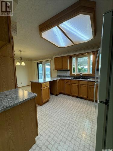 532 Simpson Crescent, Hudson Bay, SK - Indoor Photo Showing Kitchen With Double Sink