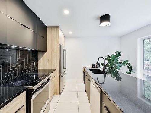 Cuisine - 1680  - 1682 Rue Barott, Mascouche, QC - Indoor Photo Showing Kitchen With Upgraded Kitchen