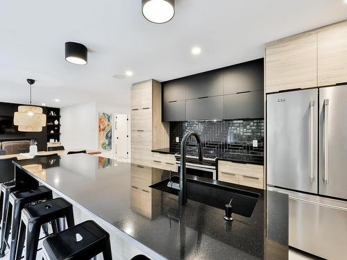 Cuisine - 1680  - 1682 Rue Barott, Mascouche, QC - Indoor Photo Showing Kitchen With Upgraded Kitchen