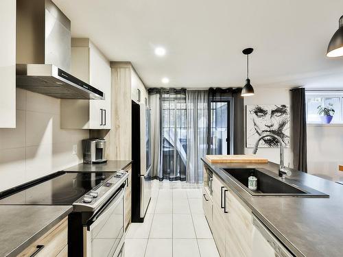 Cuisine - 1680  - 1682 Rue Barott, Mascouche, QC - Indoor Photo Showing Kitchen With Upgraded Kitchen