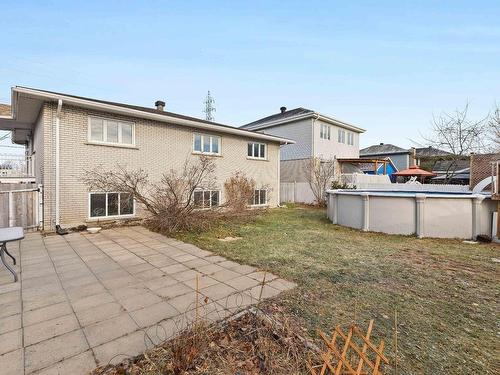 Backyard - 5886 Rue Alain, Brossard, QC - Outdoor With Above Ground Pool With Exterior