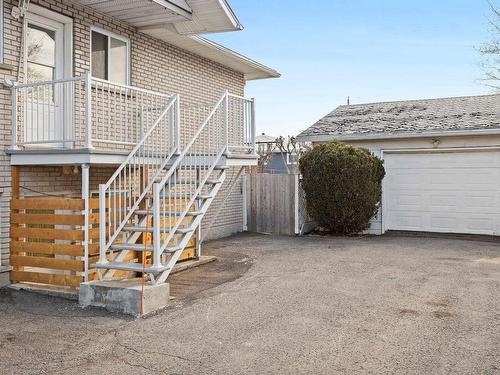 Garage - 5886 Rue Alain, Brossard, QC - Outdoor With Exterior