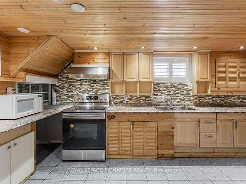 Bsmt-67 Ellington Dr, Toronto, ON - Indoor Photo Showing Kitchen With Double Sink