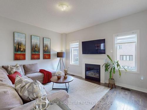 1443 Lormel Gate Ave, Innisfil, ON - Indoor Photo Showing Living Room With Fireplace