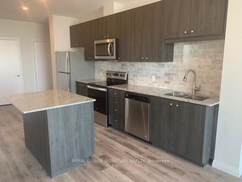 1602-104 Garment St, Kitchener, ON - Indoor Photo Showing Kitchen With Double Sink With Upgraded Kitchen