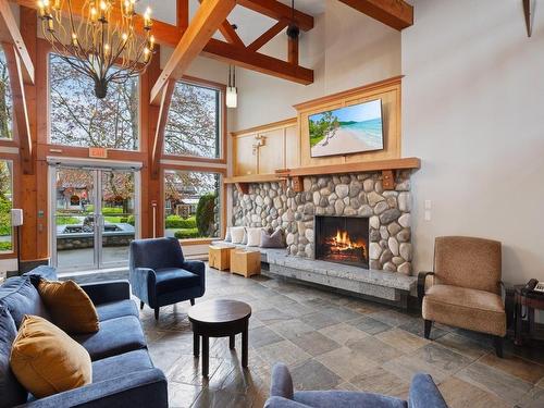 107Abcd-1800 Riverside Lane, Courtenay, BC - Indoor Photo Showing Living Room With Fireplace