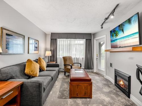 107Abcd-1800 Riverside Lane, Courtenay, BC - Indoor Photo Showing Living Room With Fireplace