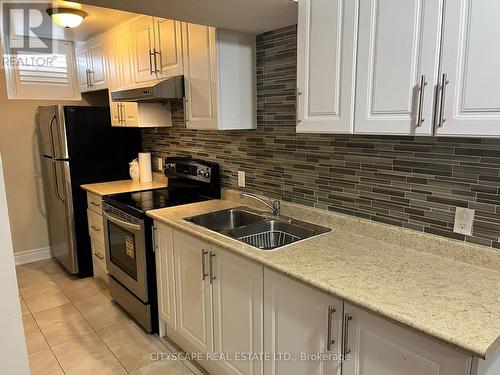 5033 Dubonet Drive, Mississauga, ON - Indoor Photo Showing Kitchen With Double Sink