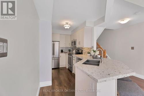 33 - 2940 Headon Forest Drive, Burlington, ON - Indoor Photo Showing Kitchen With Stainless Steel Kitchen With Double Sink