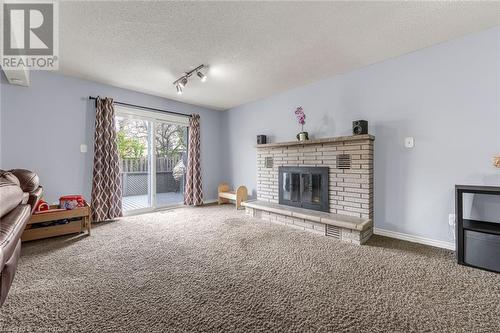 35 Titmouse Court, Hamilton, ON - Indoor Photo Showing Living Room With Fireplace