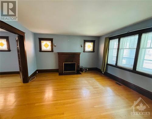 249 Powell Avenue, Ottawa, ON - Indoor Photo Showing Living Room With Fireplace