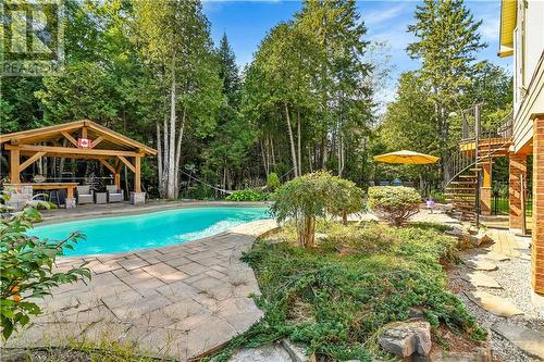 36 Sawgrass Circle, Ottawa, ON - Outdoor With In Ground Pool