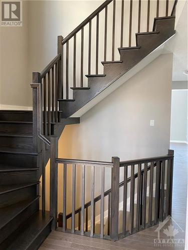 View of stairs open and finished to the lower level - 126 Boulonnaius Grove, Kanata, ON - Indoor Photo Showing Other Room