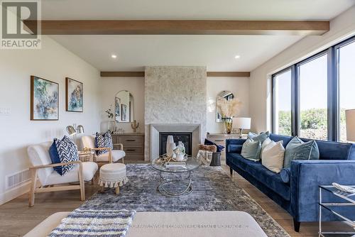 190 Timberwalk Trail, Middlesex Centre (Ilderton), ON - Indoor Photo Showing Living Room With Fireplace