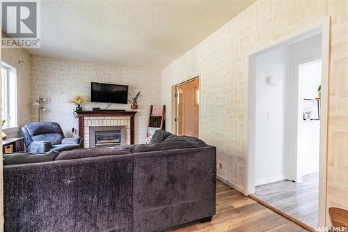 1089 Wolfe Avenue, Moose Jaw, SK - Indoor Photo Showing Living Room With Fireplace