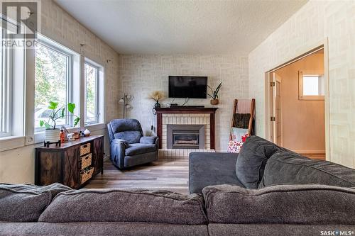 1089 Wolfe Avenue, Moose Jaw, SK - Indoor Photo Showing Living Room With Fireplace