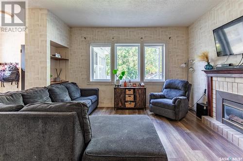 1089 Wolfe Avenue, Moose Jaw, SK - Indoor Photo Showing Living Room With Fireplace