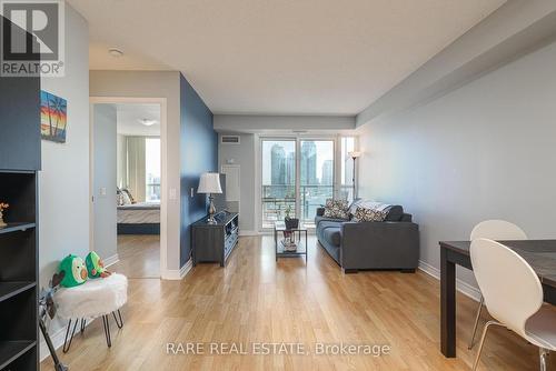 1409 - 83 Borough Drive, Toronto, ON - Indoor Photo Showing Living Room