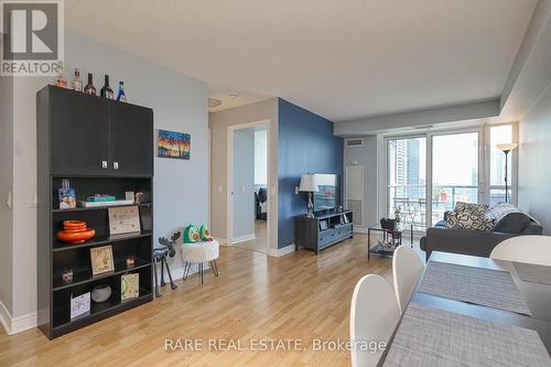 1409 - 83 Borough Drive, Toronto, ON - Indoor Photo Showing Living Room