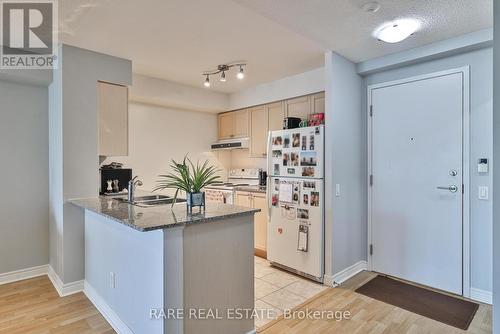 1409 - 83 Borough Drive, Toronto, ON - Indoor Photo Showing Kitchen With Double Sink