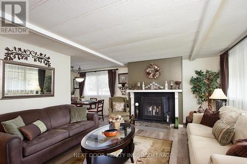 208 Biltmore Drive, South Huron (Stephen Twp), ON - Indoor Photo Showing Living Room With Fireplace