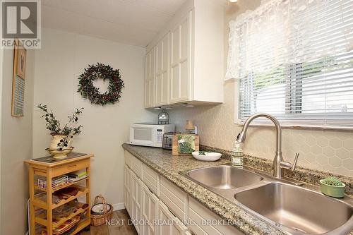 208 Biltmore Drive, South Huron (Stephen Twp), ON - Indoor Photo Showing Kitchen With Double Sink