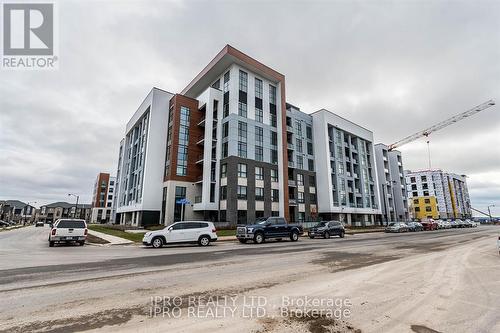 313 - 460 Gordon Krantz Avenue, Milton, ON - Outdoor With Facade