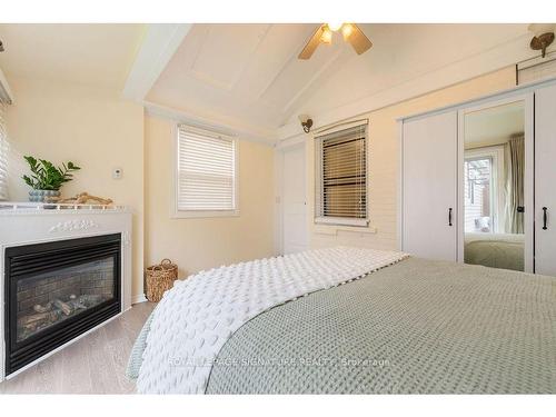 385 Whitmore Ave, Toronto, ON - Indoor Photo Showing Bedroom With Fireplace