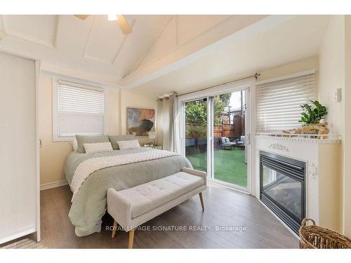 385 Whitmore Ave, Toronto, ON - Indoor Photo Showing Bedroom With Fireplace