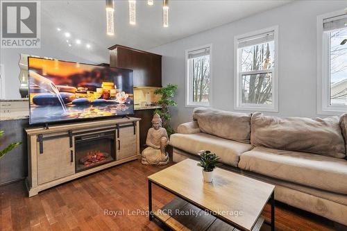 3 Wisteria Court, Kitchener, ON - Indoor Photo Showing Living Room With Fireplace